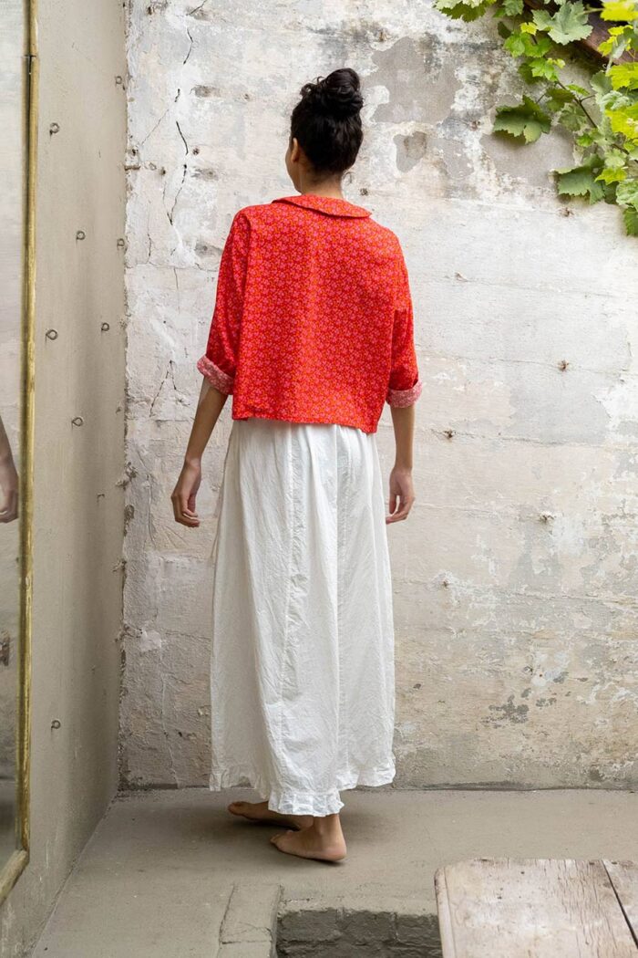 model wearing panelled skirt sula cotton panelled skirt and round collar shirt