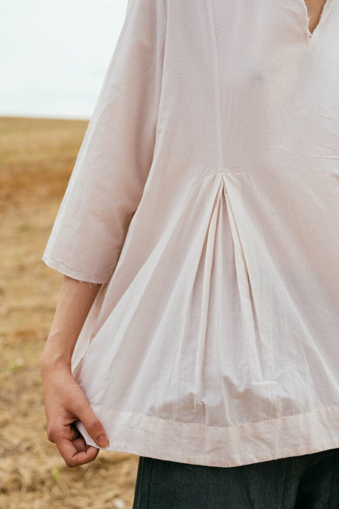 model wearing double pleat top sula Cotton top with pleats