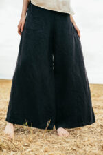 model wearing mud pants sula Linen wide leg pants