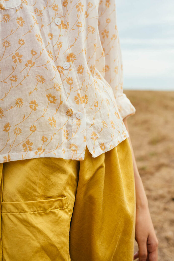 model wearing round collar shirt sula Long sleeve printed shirt