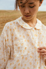 model wearing round collar shirt sula Long sleeve printed shirt