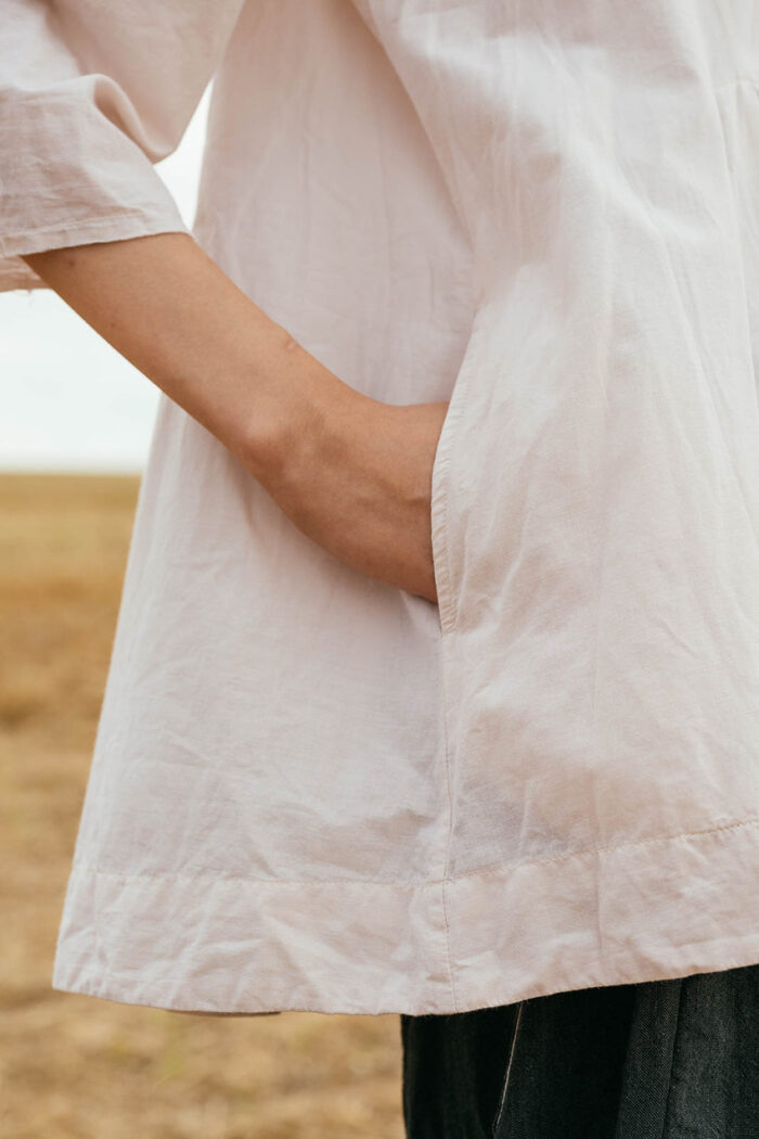 model wearing double pleat top sula Cotton top with pleats