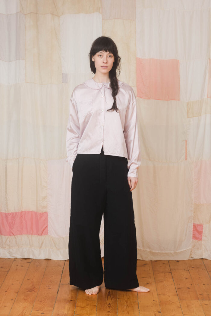 model wearing round collar shirt sula Satin round collar shirt and tailored pants