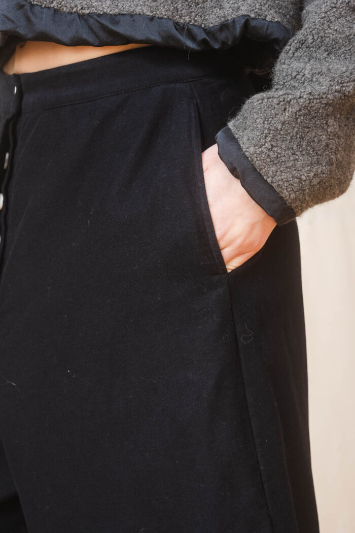model wearing tailored pants sula Cotton barrel leg pants