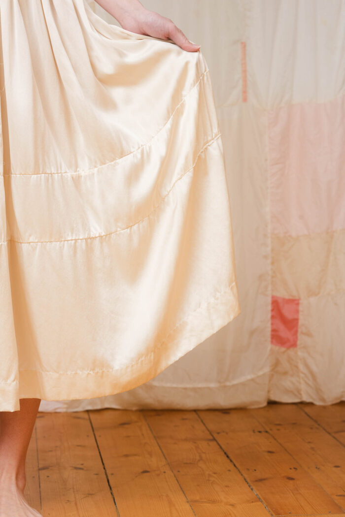model wearing big satin skirt sula Long silk gathered skirt