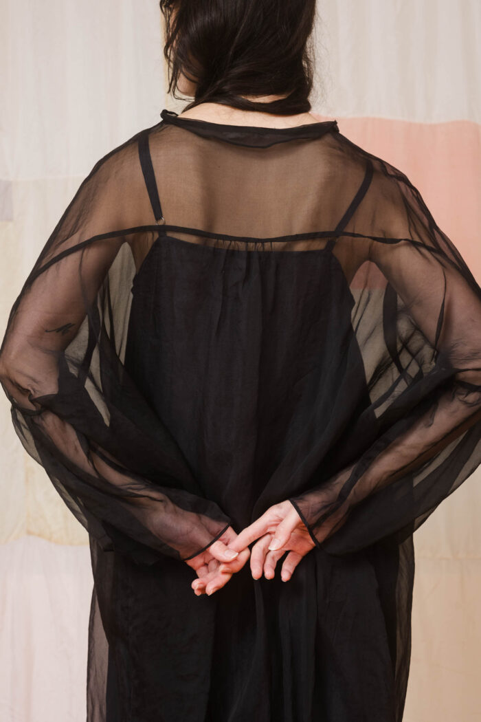 model wearing lead dress sula Oversized silk organza dress