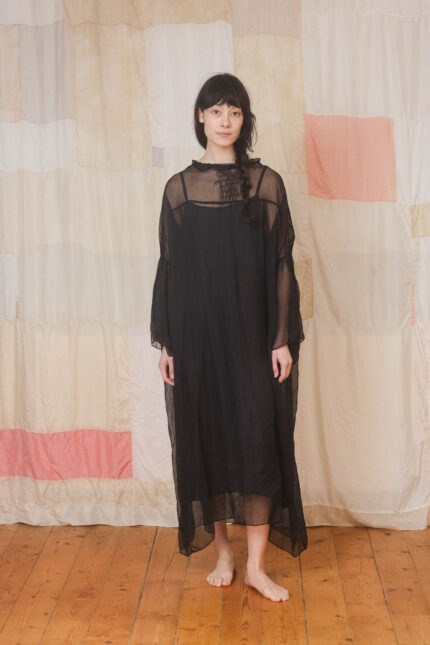 model wearing lead dress sula Oversized silk organza dress