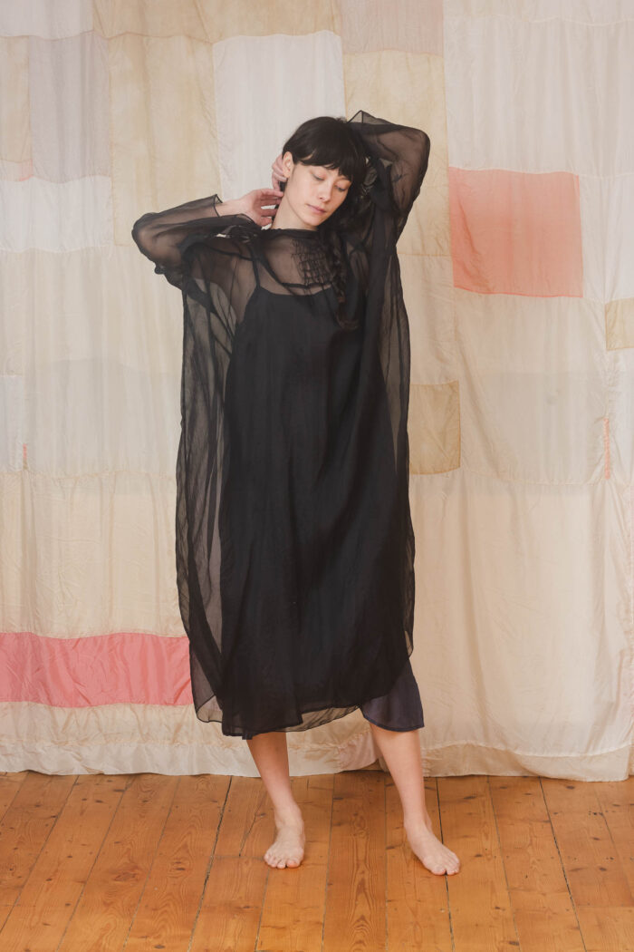 model wearing lead dress sula Oversized silk organza dress