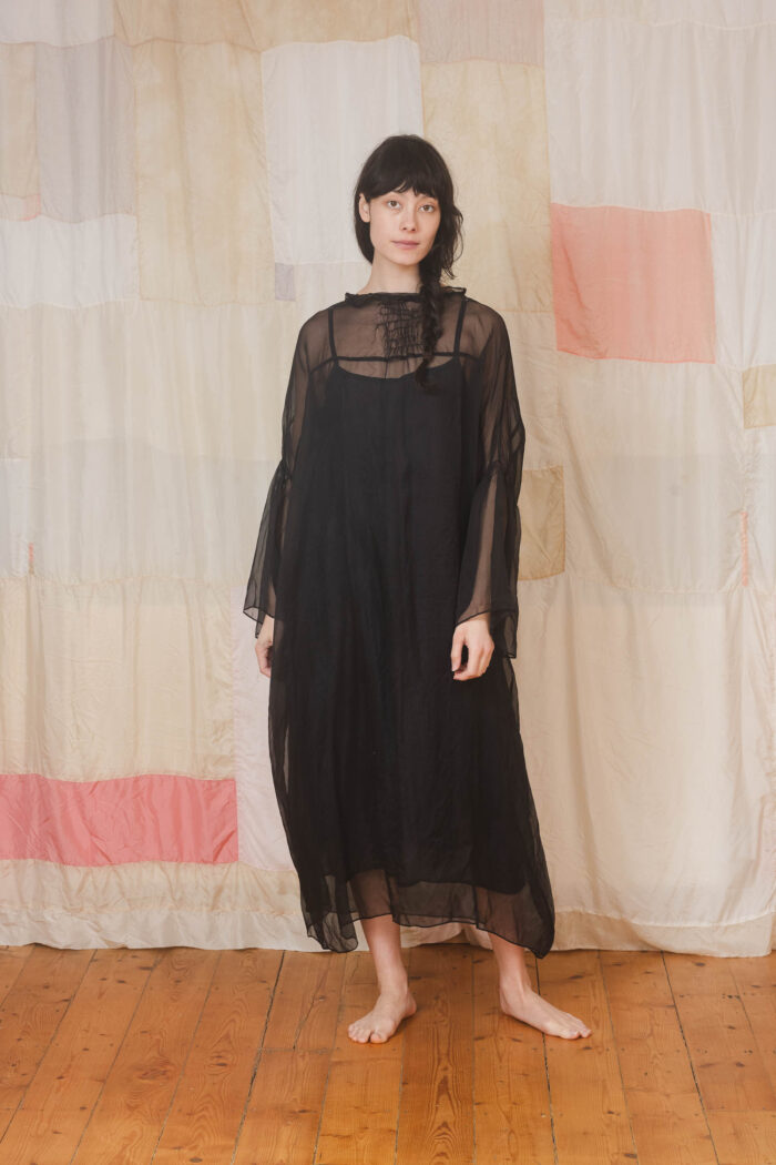 model wearing lead dress sula Oversized silk organza dress
