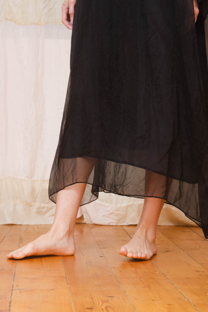 model wearing lead dress sula Oversized silk organza dress
