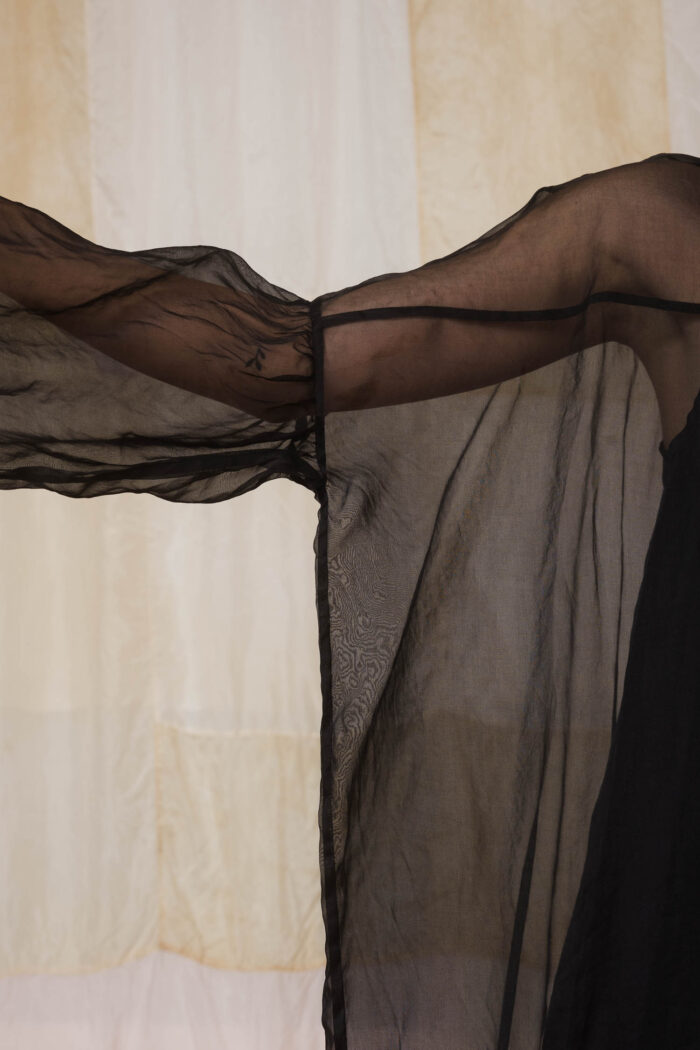 model wearing lead dress sula Oversized silk organza dress