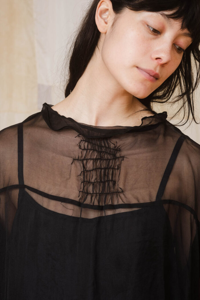 model wearing lead dress sula Oversized silk organza dress