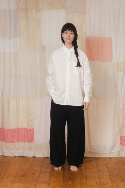 model wearing man shirt sula Cotton long sleeve shirt and tailored pants