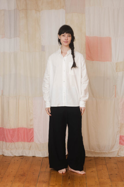 model wearing man shirt sula Cotton long sleeve shirt and tailored pants