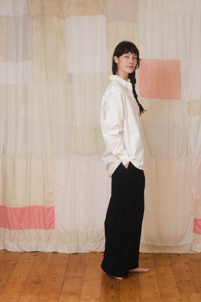 model wearing man shirt sula Cotton long sleeve shirt and tailored pants