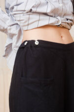 model wearing mud pants sula Wide leg pants