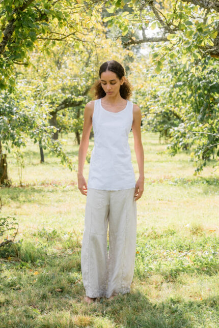 model wearing apron blouse