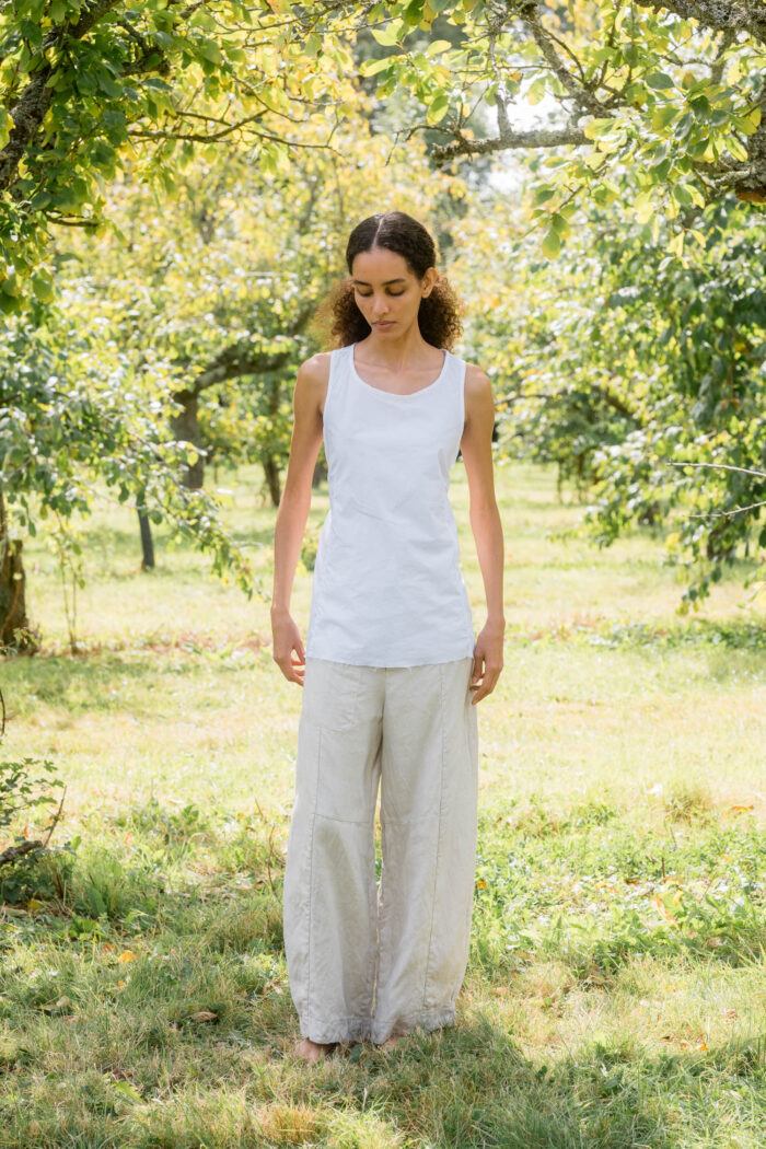 model wearing apron blouse