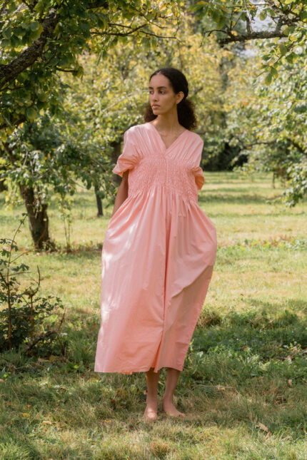 model wearing asymmetric moonbeam dress sula cotton gathered dress
