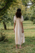 model wearing asymmetric moonbeam dress sula silk gathered dress
