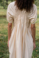 model wearing asymmetric moonbeam dress sula silk gathered dress