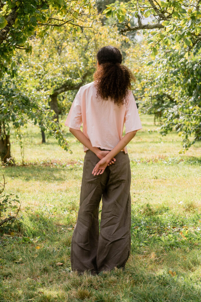 model wearing clean new shirt tiny check sula boxy check shirt