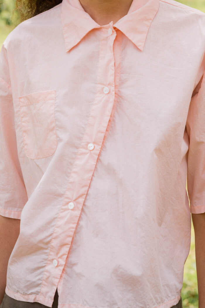 model wearing clean new shirt tiny check sula boxy check shirt
