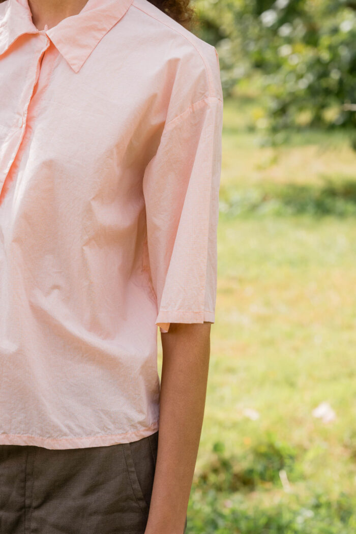 model wearing clean new shirt tiny check sula boxy check shirt