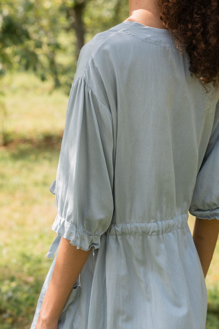 model wearing comfy pocket dress scs sula silk drawstring dress