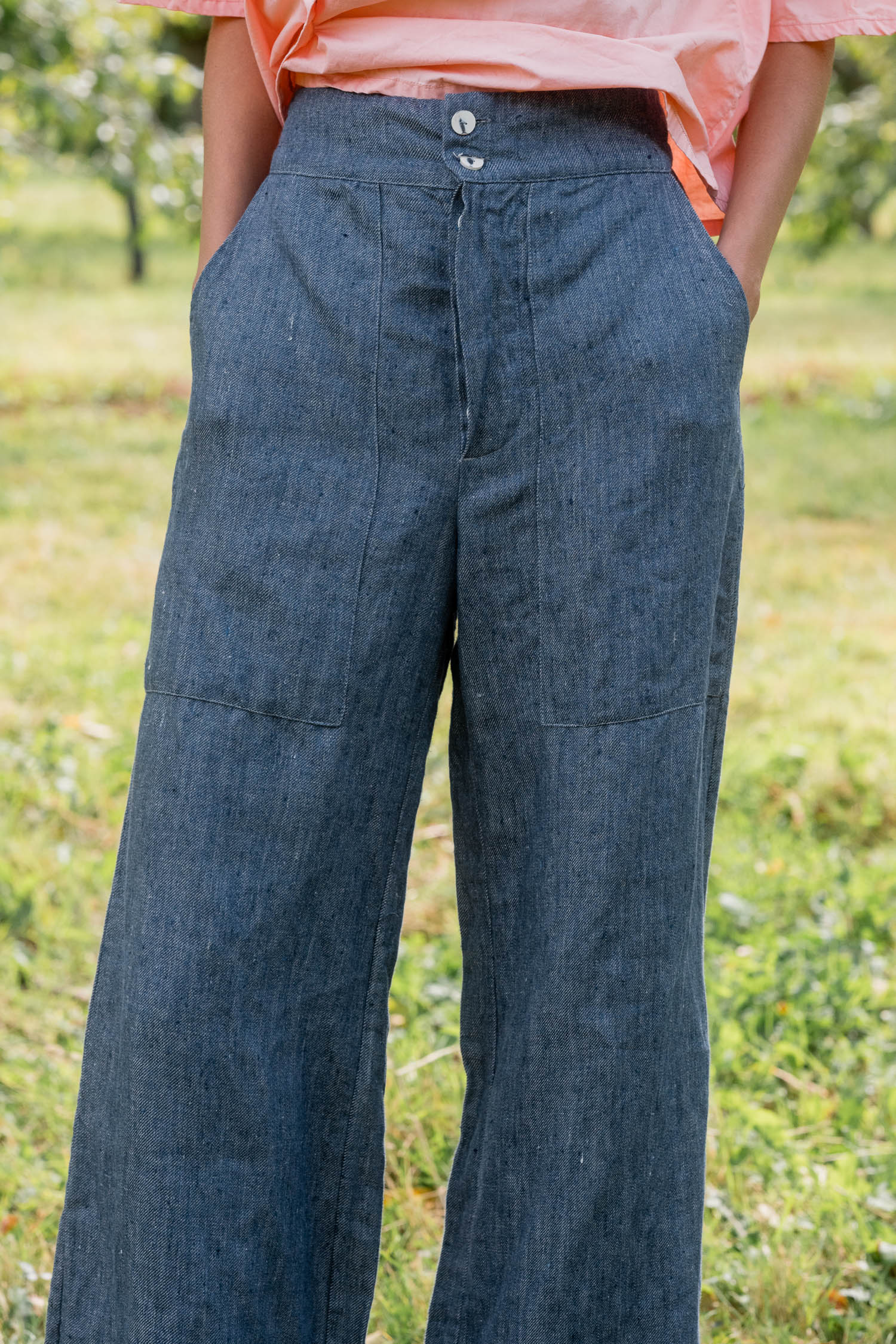 model wearing flare pants denim