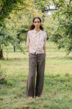 model wearing flare linen pants sula linen seventies trousers
