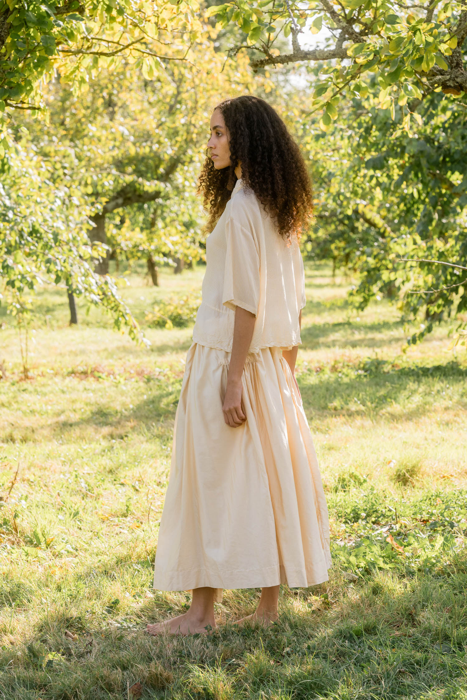 model wearing ss25 Frida skirt silk cotton satin
