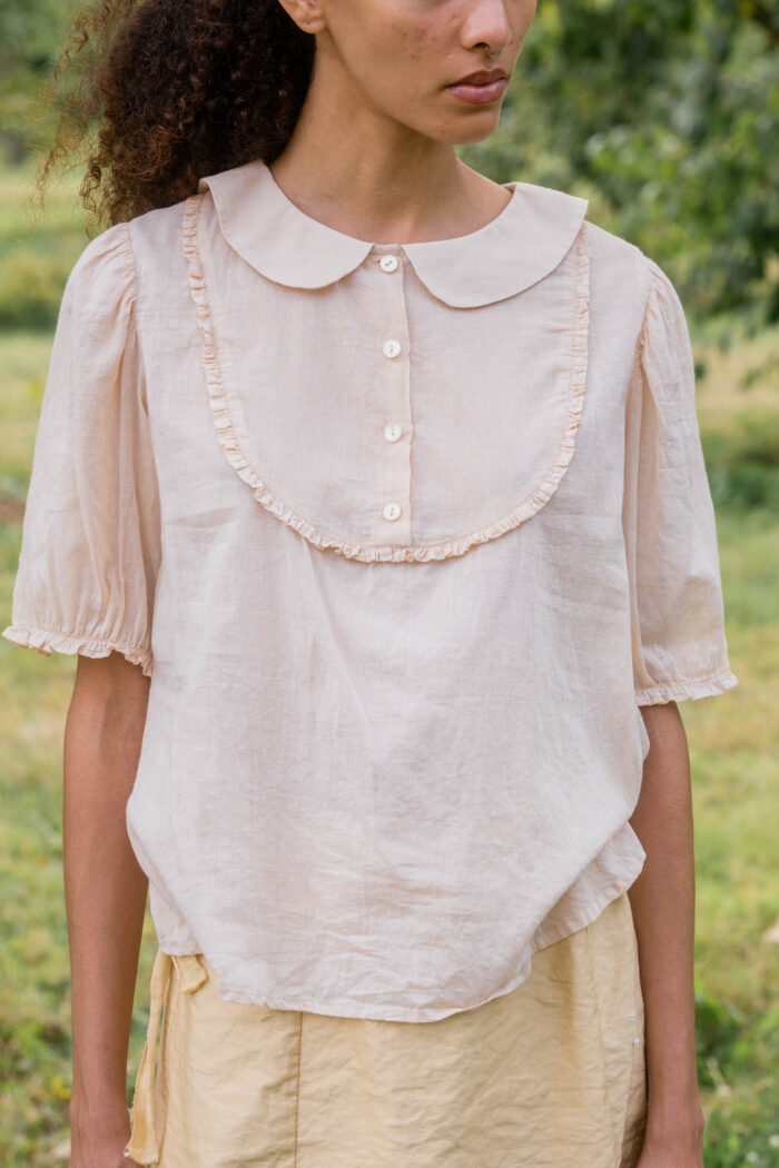 model wearing frill yoke blouse cotton voile