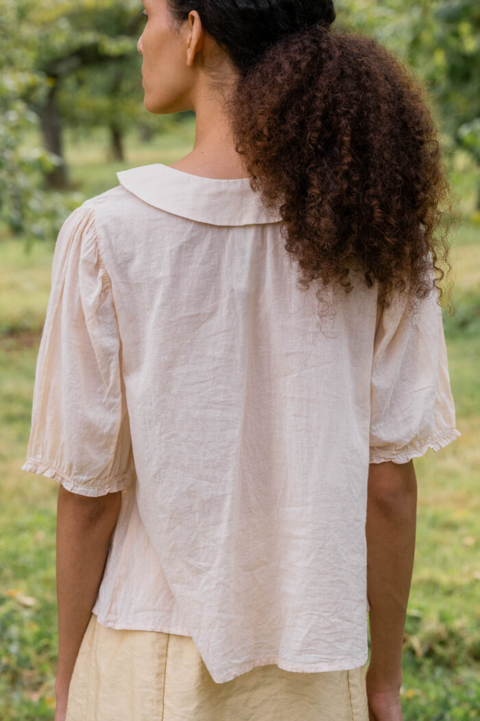 model wearing frill yoke blouse cotton voile