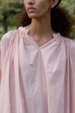 model wearing gathered dress tiny check sula oversize check dress
