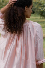 model wearing gathered dress tiny check sula oversize check dress