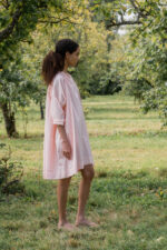 model wearing gathered dress tiny check sula oversize check dress