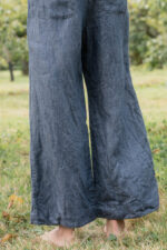 model wearing hem pants denim sula high waisted denim pants