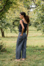 model wearing hem pants denim sula high waisted denim pants