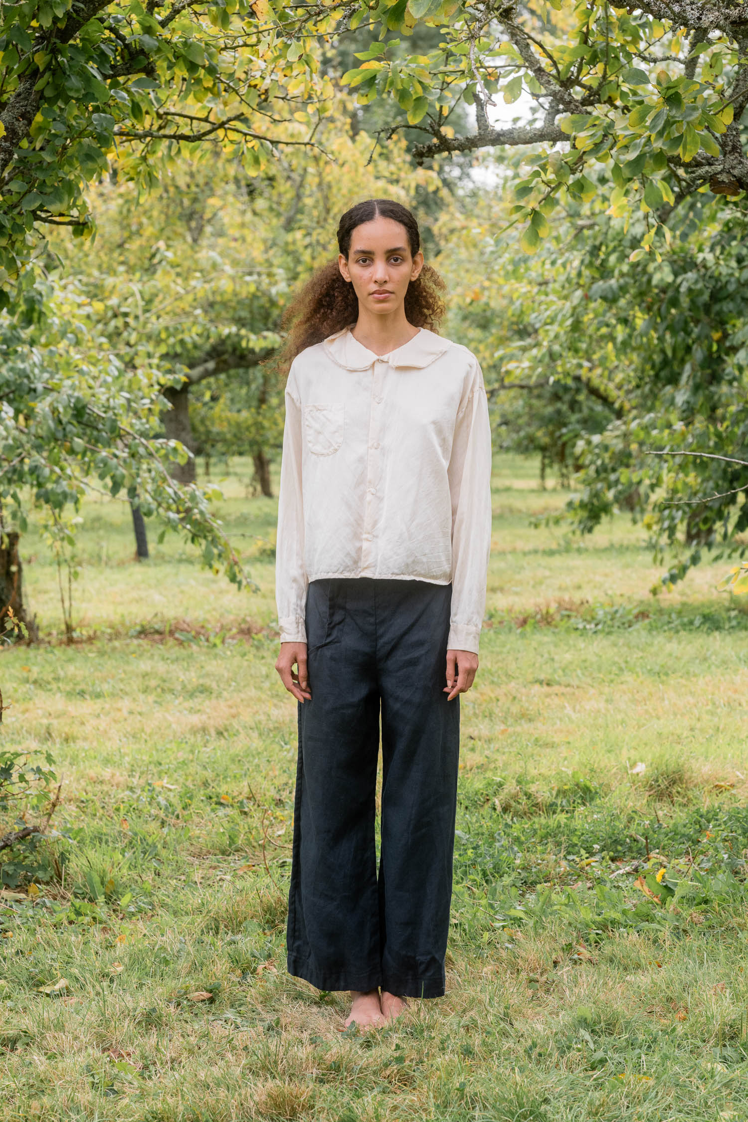 ss25 hem pants linen model wearing hem pants linen