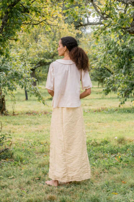 model wearing idle skirt belice back