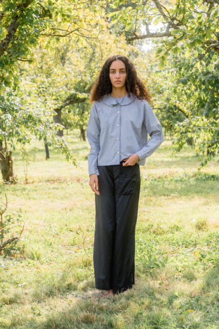 model wearing puckered collar shirt tiny check