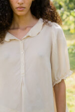 model wearing sheet blouse stripy turchi