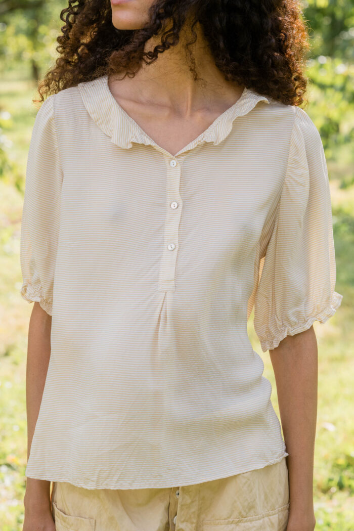 model wearing sheet blouse stripy turchi