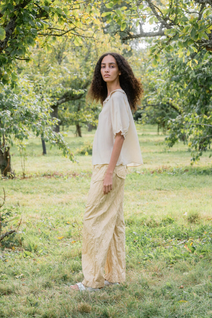 model wearing sheet blouse stripy turchi