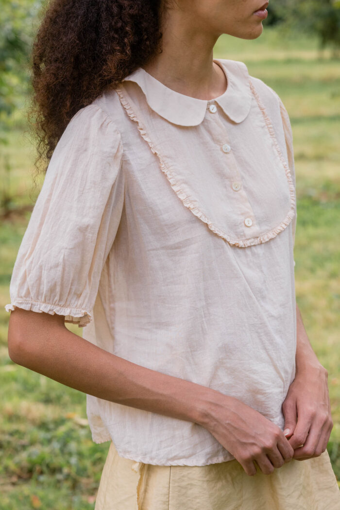 model wearing frill yoke blouse cotton voile