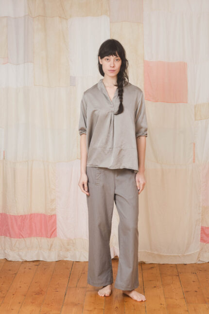 model wearing cp pants sula Fitted high waist pants and sunny shirt long