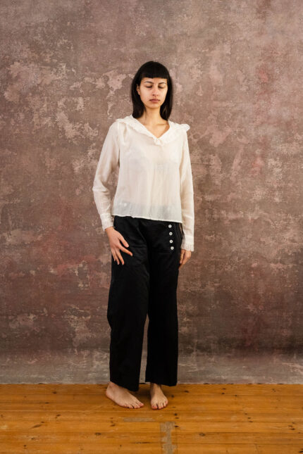 model wearing frill blouse sula blouse with frill collar