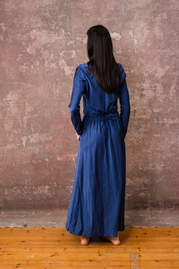 model wearing winter bias cut dress sula long satin bias cut dress