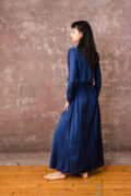 model wearing winter bias cut dress sula long satin bias cut dress